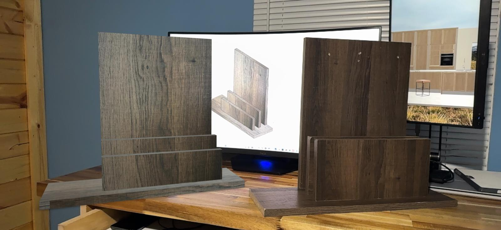 On a desk: the textured AR model on the left, the finished scrap-wood unit on the right, and the same model open in SketchUp on the monitor between them